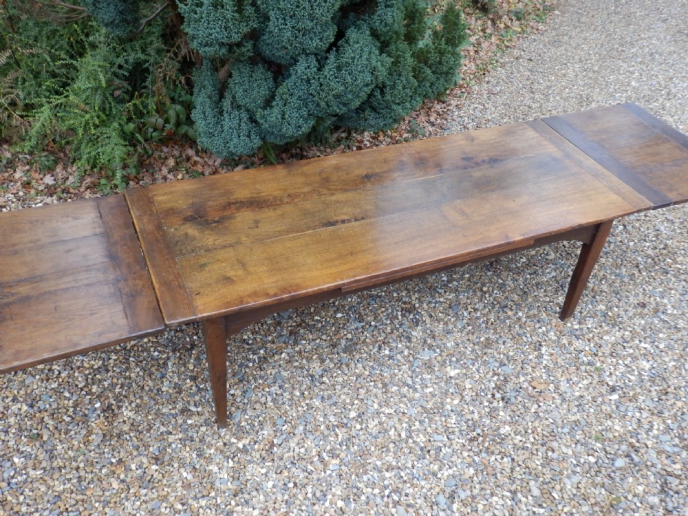 French Oak extending dining table. 348cm x 86cm. Height 75cm View VII
