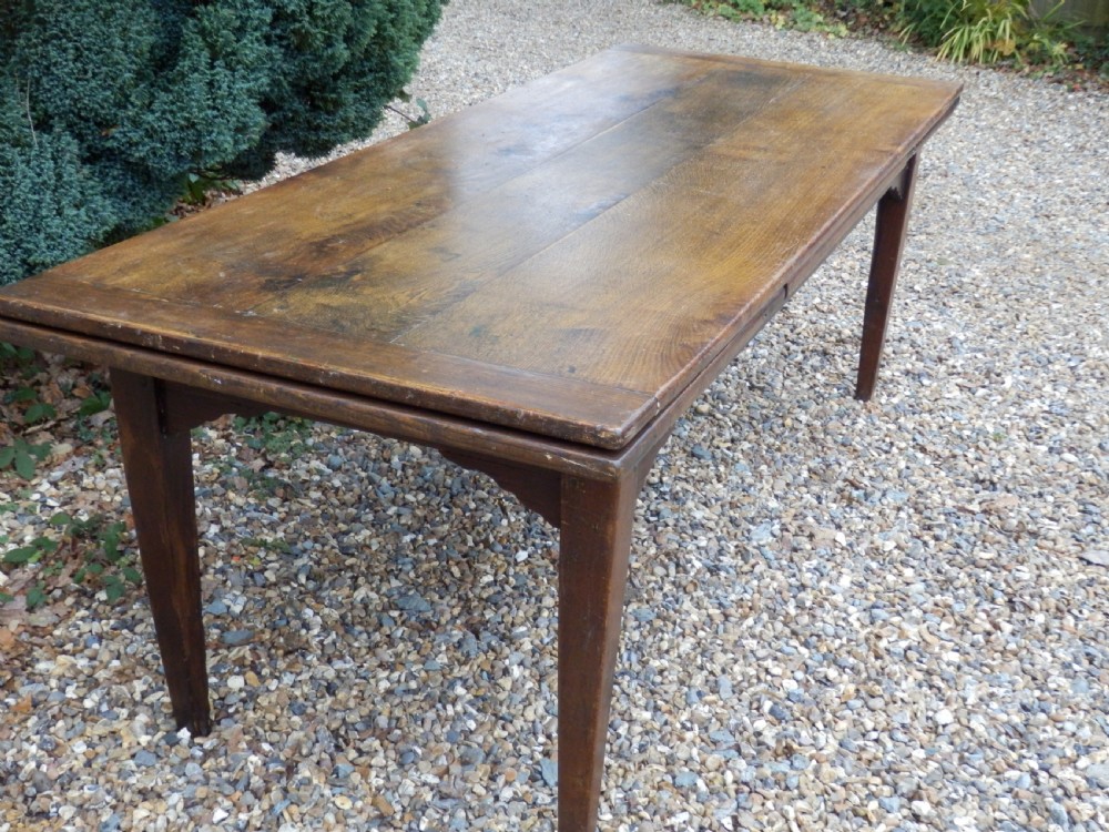 French Oak extending dining table. 348cm x 86cm. Height 75cm View IX