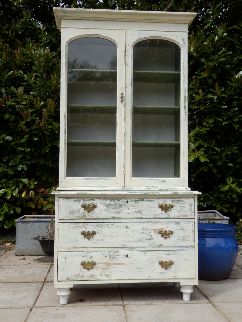 Pine dresser in two sections finished in distressed paint