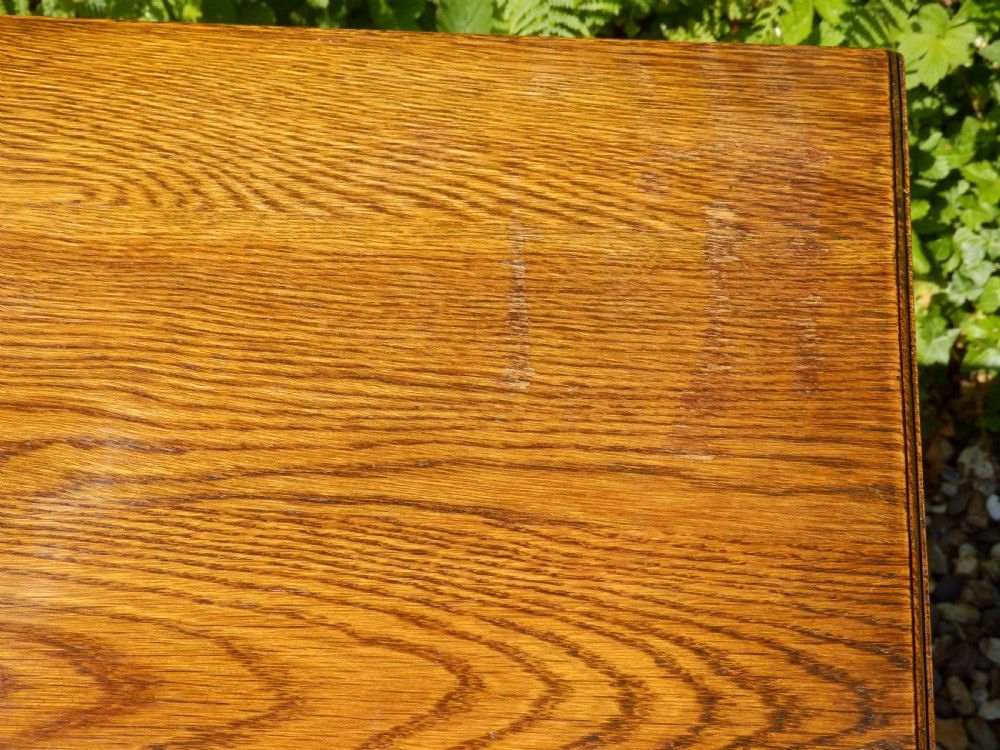 A pair of solid oak Arts and Crafts side tables. View II