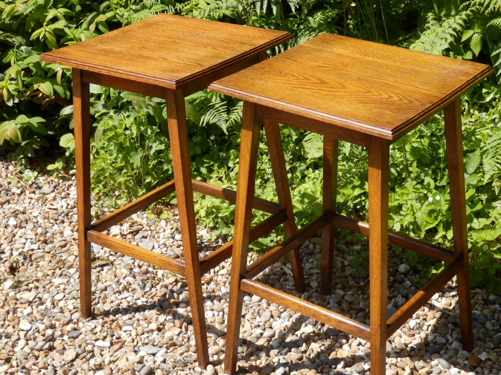 A pair of solid oak Arts and Crafts side tables. View IV