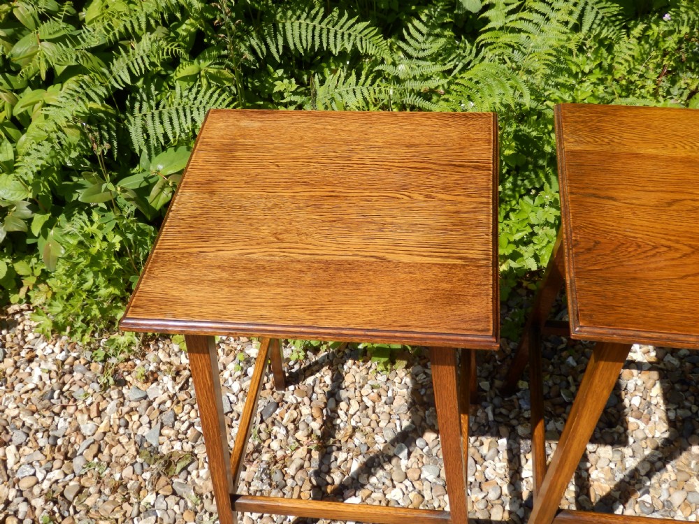 A pair of solid oak Arts and Crafts side tables. View V