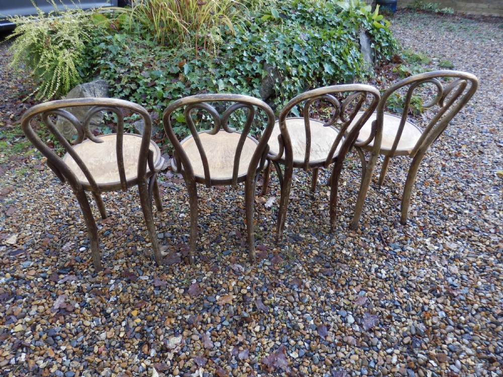 A set of 8 Romanian bentwood 'sweetheart' chairs View X