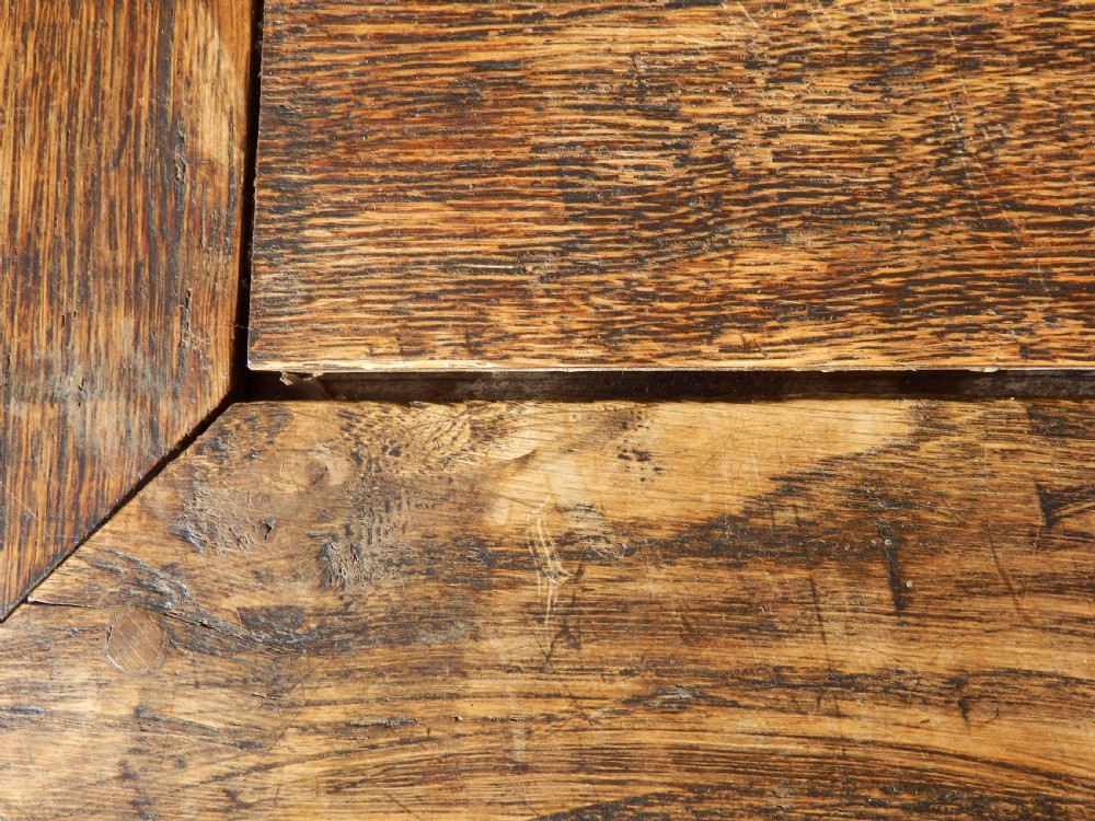 An extended antique Georgian oak dining table featuring turned legs, perimeter box stretchers, and draw-leaf extensions extending to 2.9 metres. View XXI