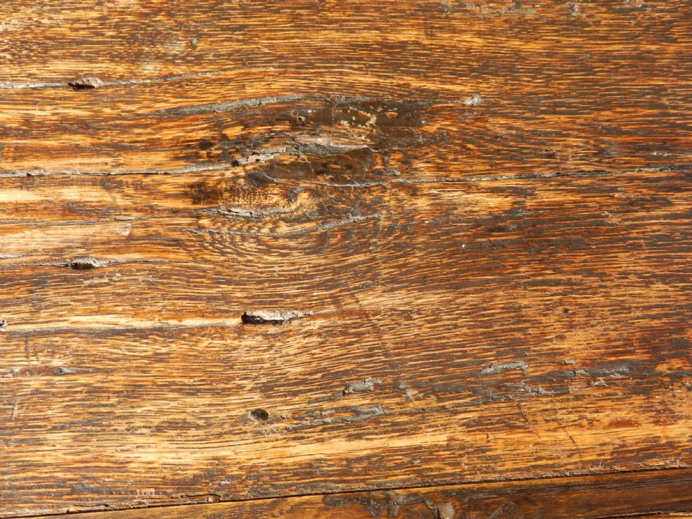 An extended antique Georgian oak dining table featuring turned legs, perimeter box stretchers, and draw-leaf extensions extending to 2.9 metres. View XXII