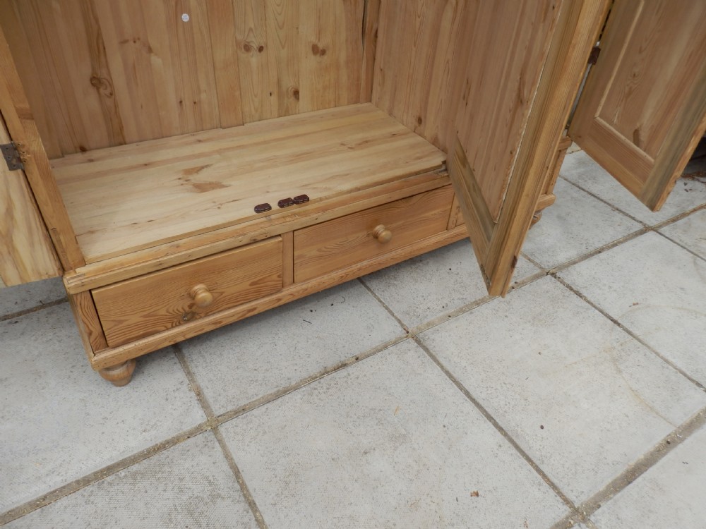 Continental 'flat pack' pine wardrobe. View V