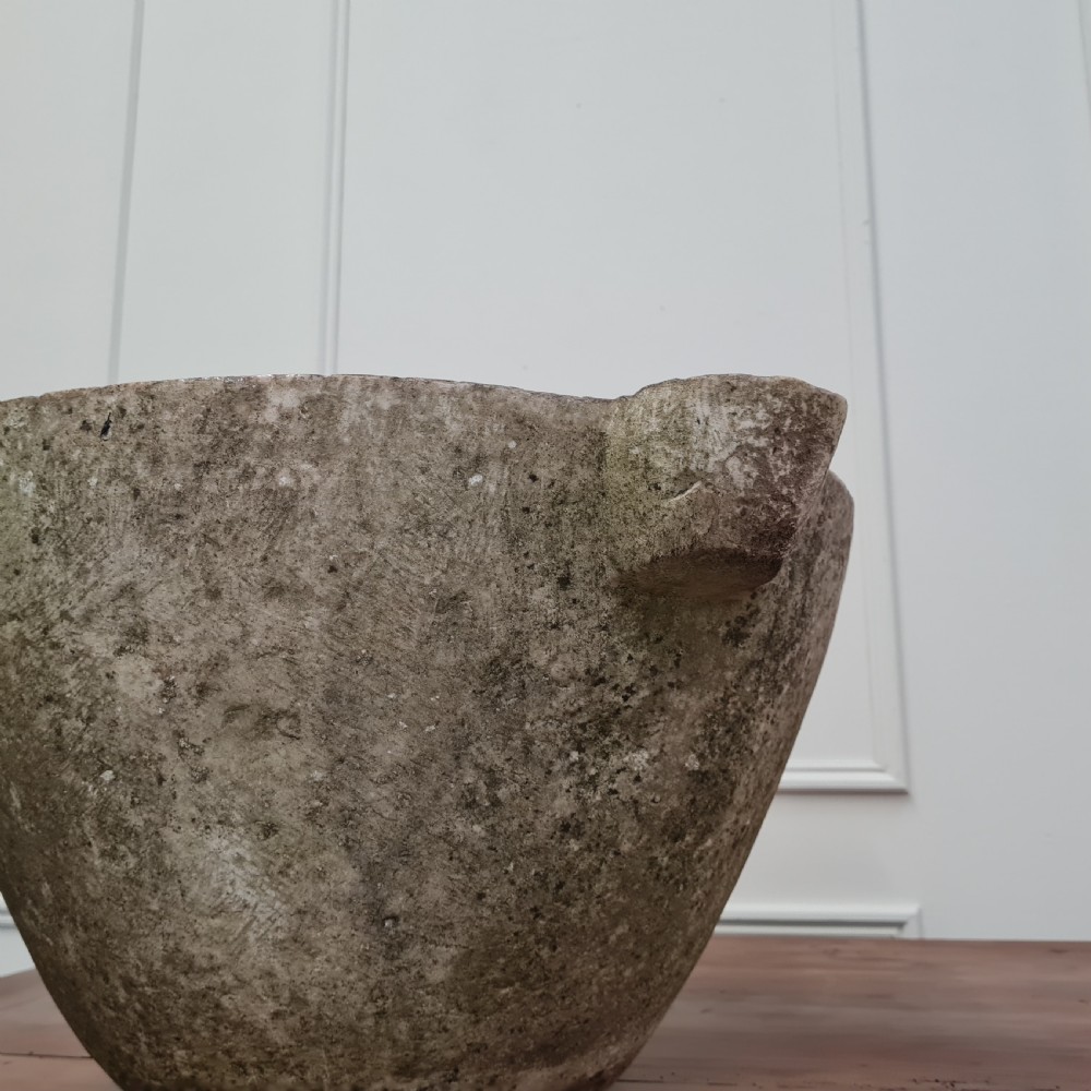An 18th-century carved white marble mortar featuring four lug handles and a worn interior basin. View III