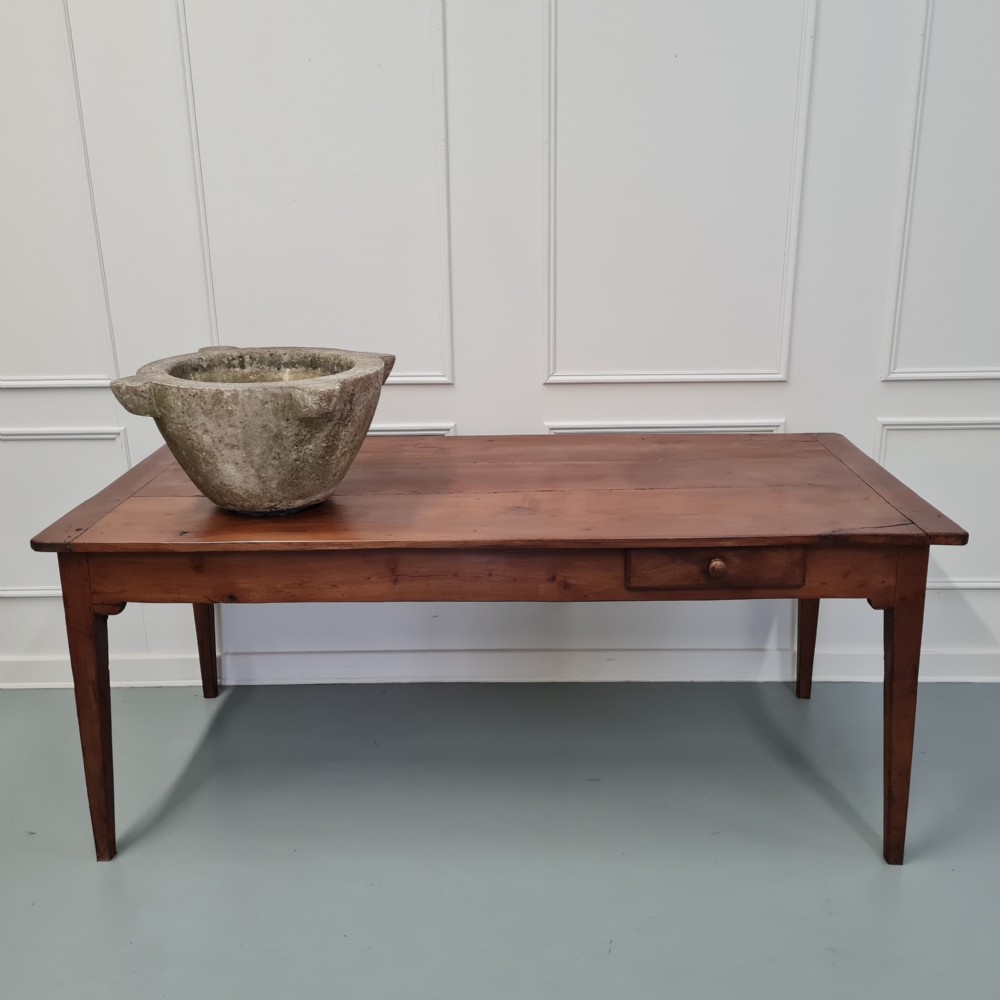 An 18th-century carved white marble mortar featuring four lug handles and a worn interior basin. View IX
