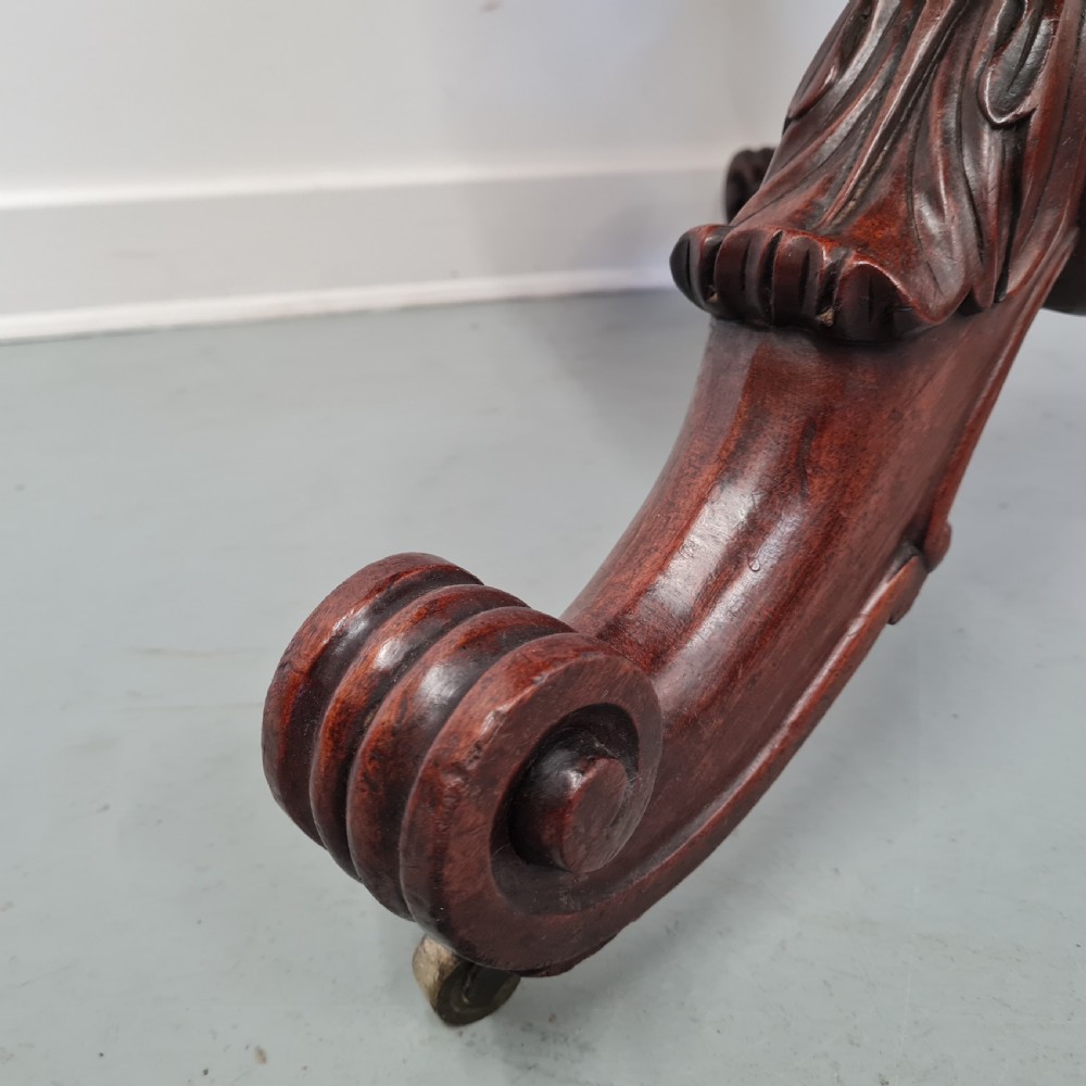 A 19th-century French gueridon table featuring a circular white marble top supported by a carved dark mahogany pedestal and scrolled tripod base. View VIII