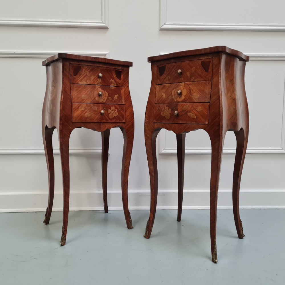 Pair of slender French Kingwood bedside tables with floral marquetry drawers and cabriole legs featuring brass sabots. View III