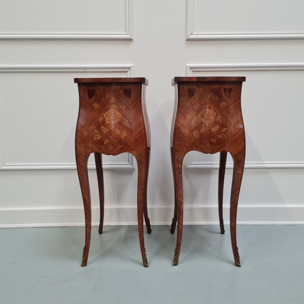 Pair of slender French Kingwood bedside tables with floral marquetry drawers and cabriole legs featuring brass sabots. View VII