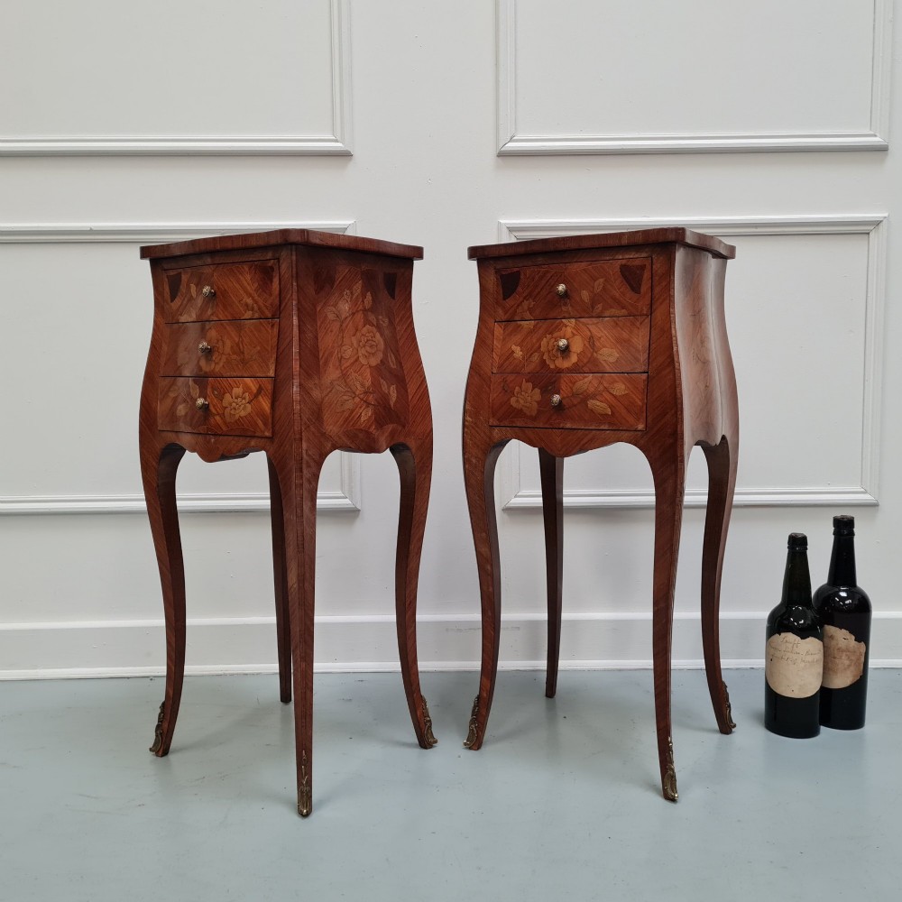 Pair of slender French Kingwood bedside tables with floral marquetry drawers and cabriole legs featuring brass sabots. View VIII