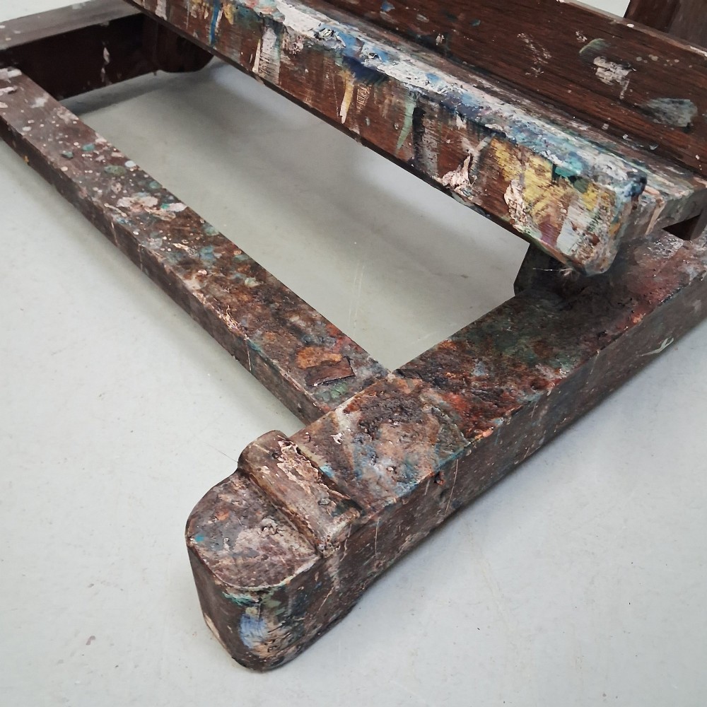 A dark oak French tabletop easel from circa 1930 featuring paint splatter details along the adjustable support ledge and central vertical frame. View IV