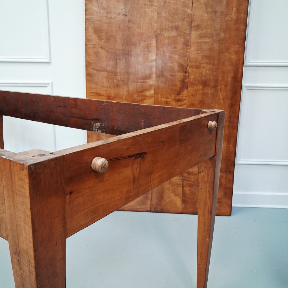 An antique 19th-century satin birch farmhouse table featuring a rectangular plank top, deep apron, and four square tapered legs. View XII