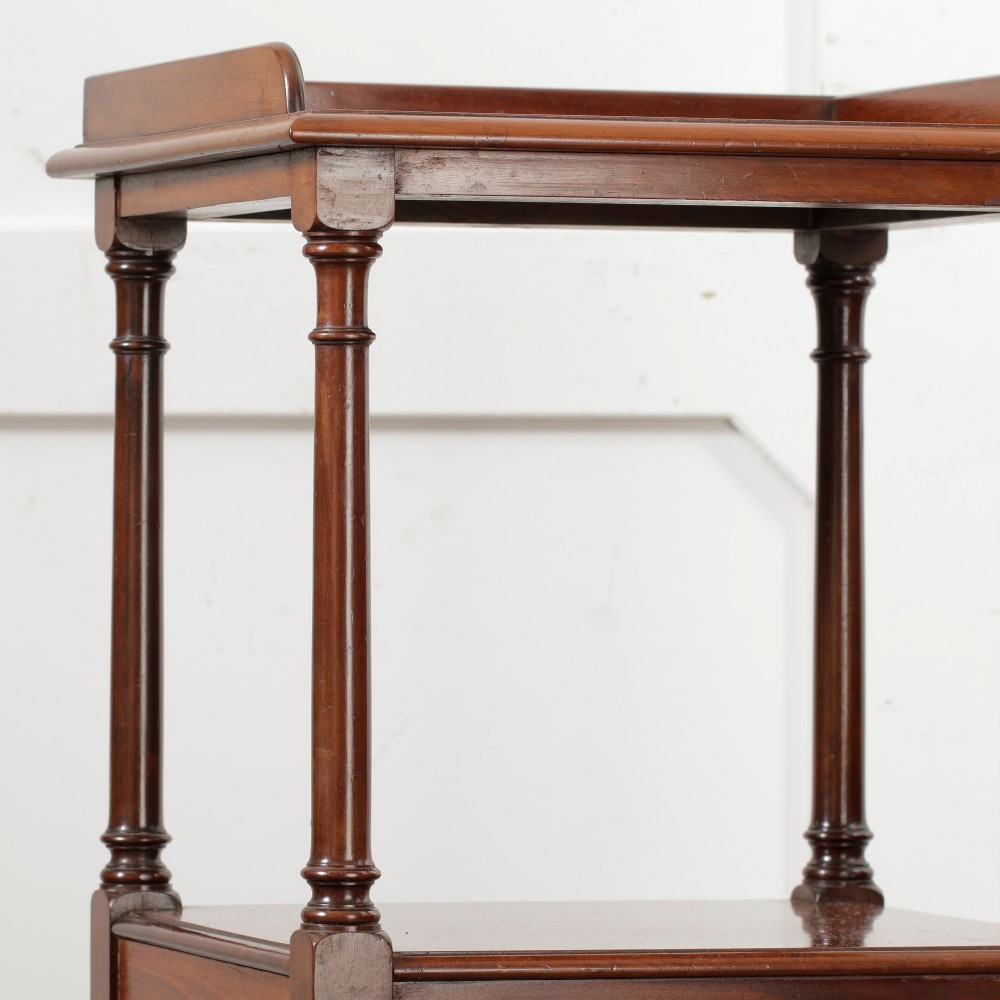 A Victorian mahogany pot cupboard with an open upper shelf supported by turned columns, sitting above a single-door cupboard adorned with a central marquetry inlay. View XII