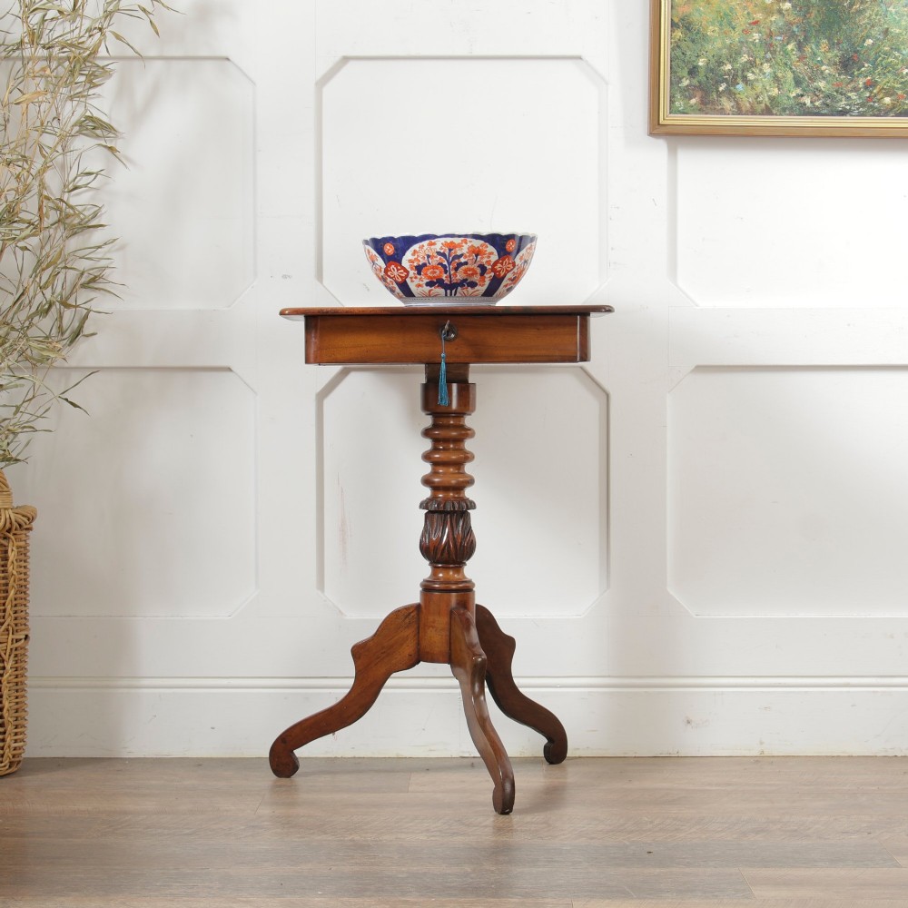A Victorian mahogany pedestal table featuring a square top with a drawer, a central bobbin-turned stem, and a carved tripod base. View II