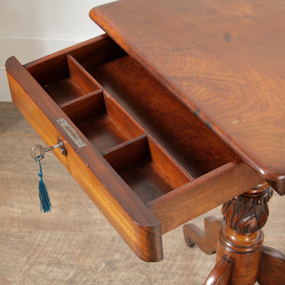A Victorian mahogany pedestal table featuring a square top with a drawer, a central bobbin-turned stem, and a carved tripod base. View IV