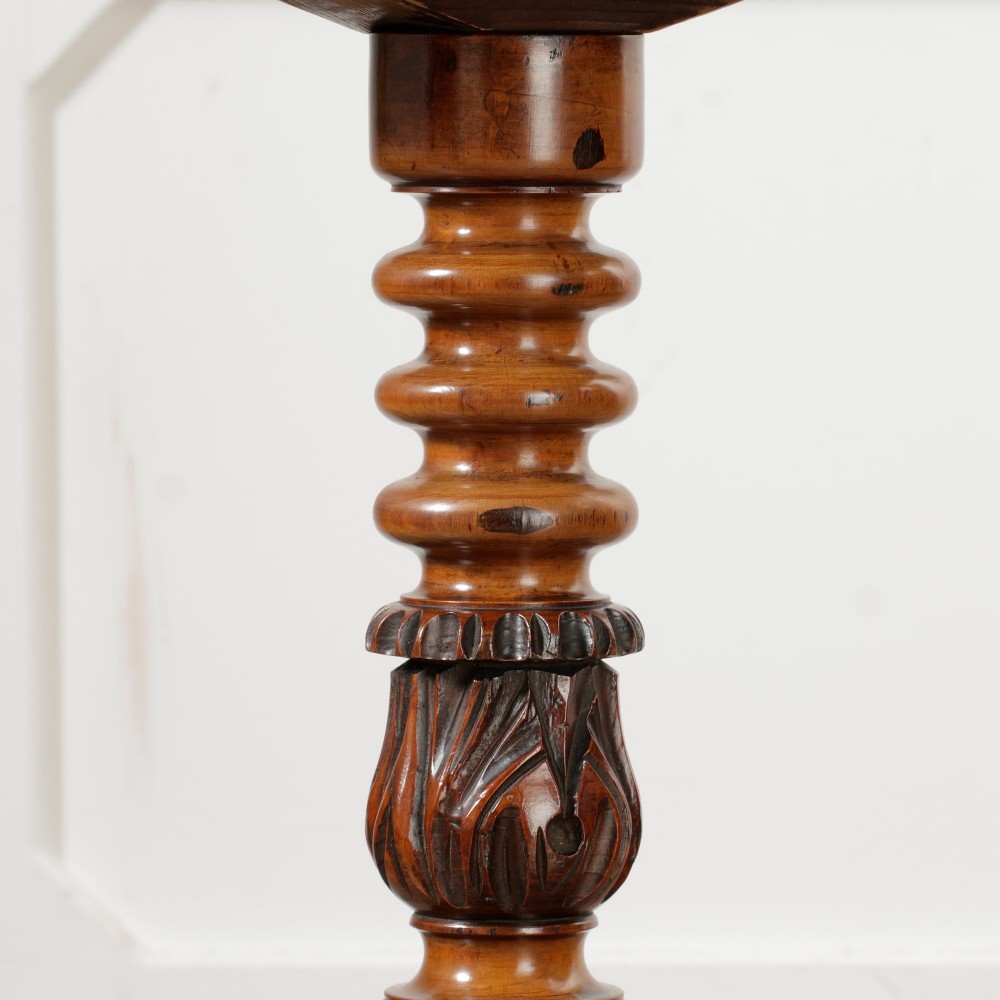 A Victorian mahogany pedestal table featuring a square top with a drawer, a central bobbin-turned stem, and a carved tripod base. View VII