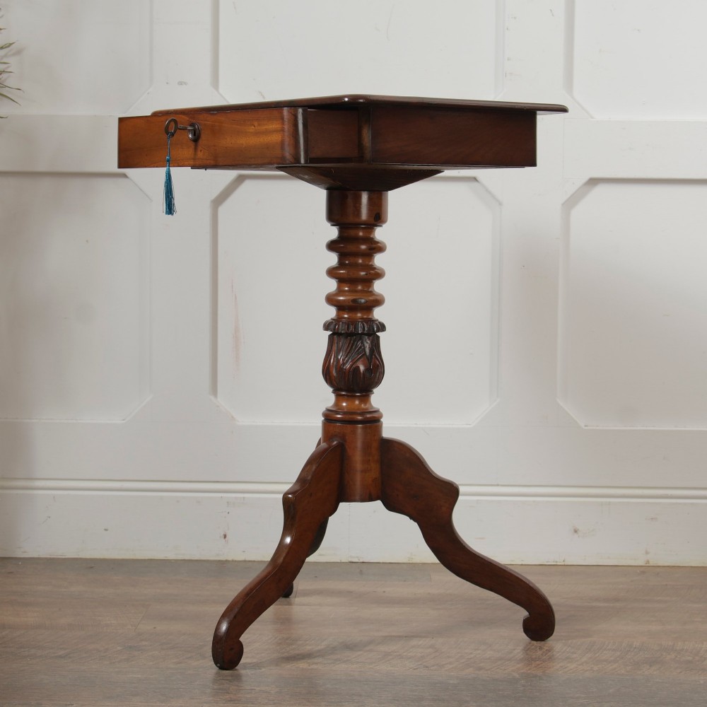A Victorian mahogany pedestal table featuring a square top with a drawer, a central bobbin-turned stem, and a carved tripod base. View IX