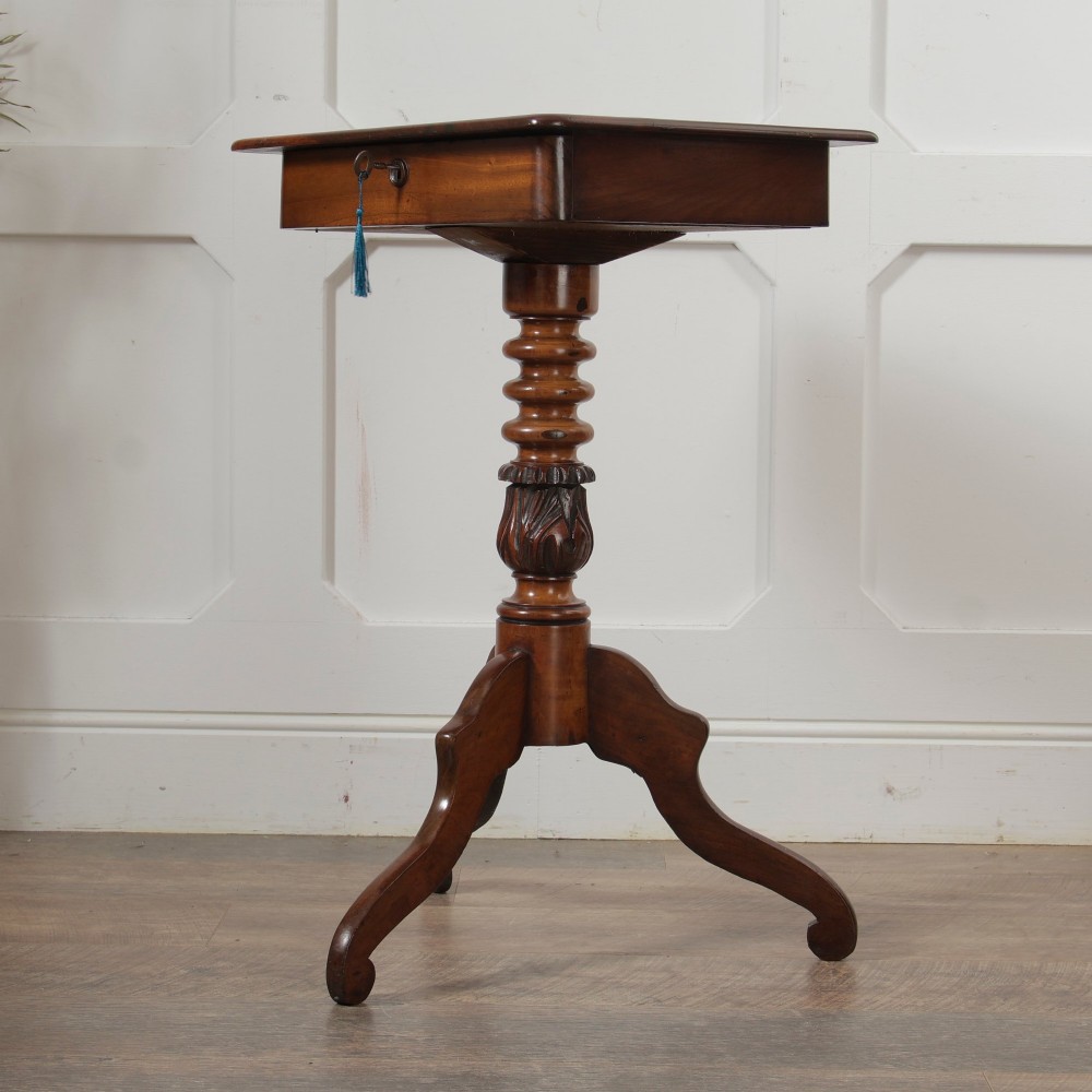 A Victorian mahogany pedestal table featuring a square top with a drawer, a central bobbin-turned stem, and a carved tripod base. View X
