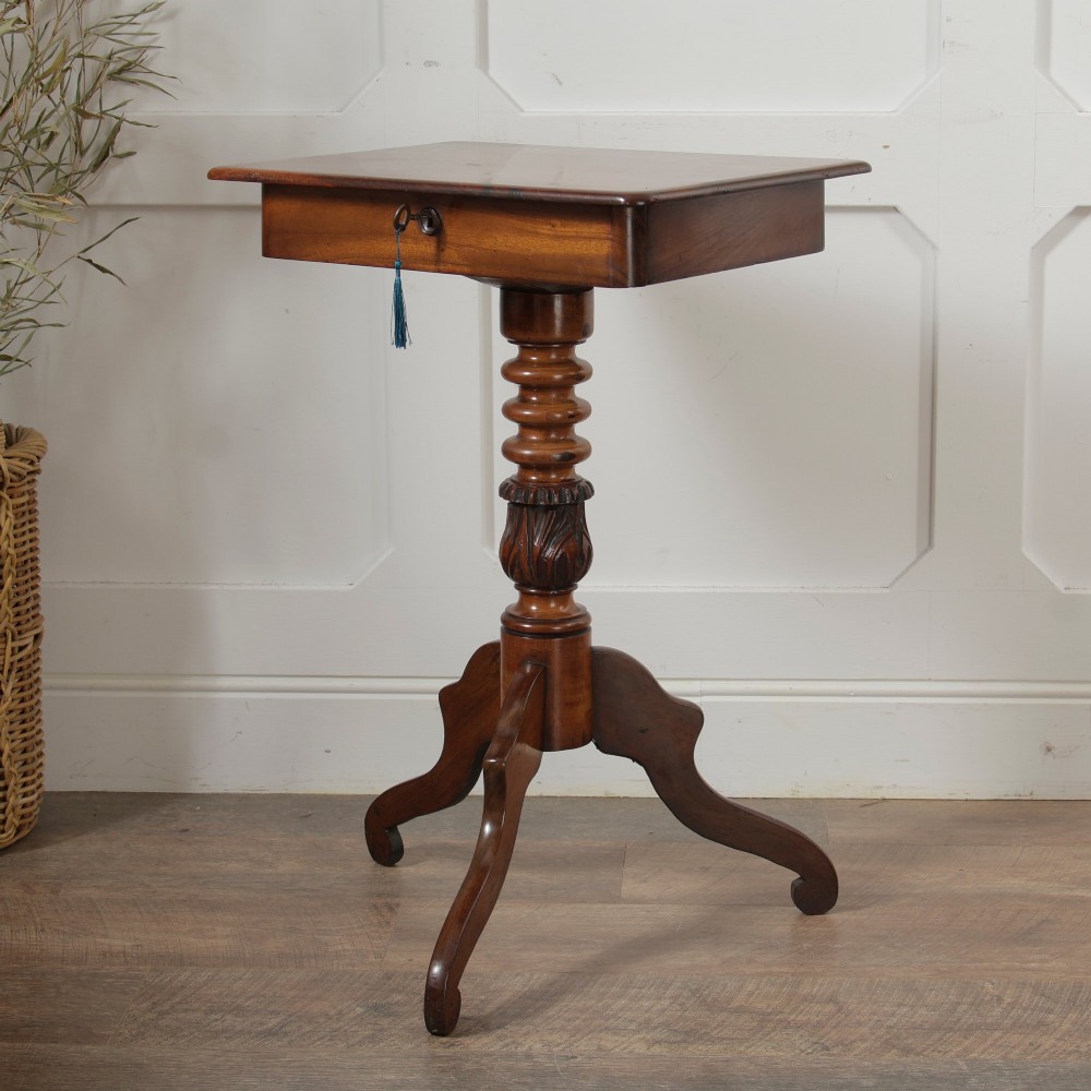 A Victorian mahogany pedestal table featuring a square top with a drawer, a central bobbin-turned stem, and a carved tripod base. View XV