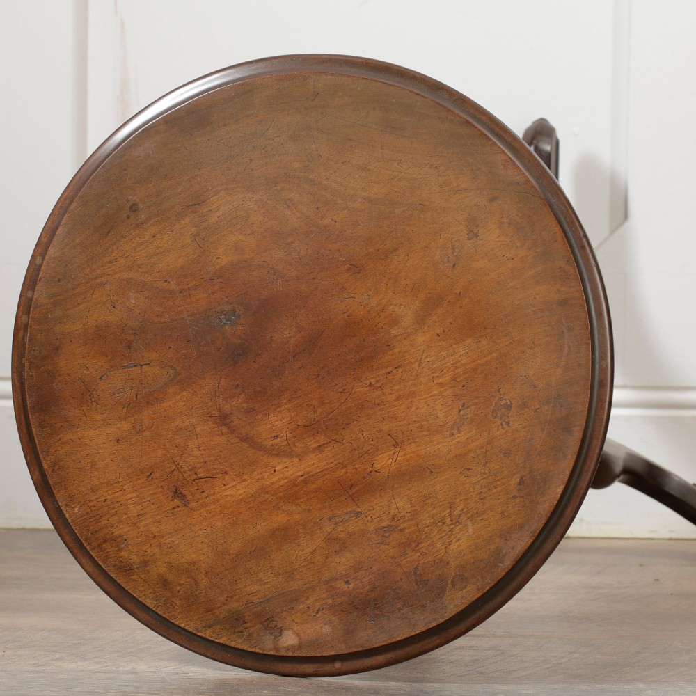 A Victorian dark walnut pedestal table featuring a circular top, a central barley twist turned column, and a tripod base. View VIII