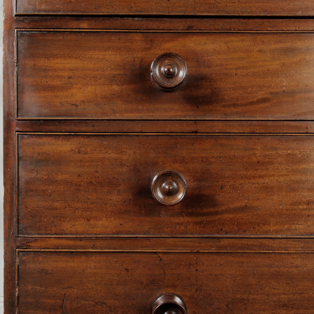 A 19th-century mahogany secretaire bookcase featuring an upper glazed cabinet with gothic arch doors and a lower chest of drawers. View XIII