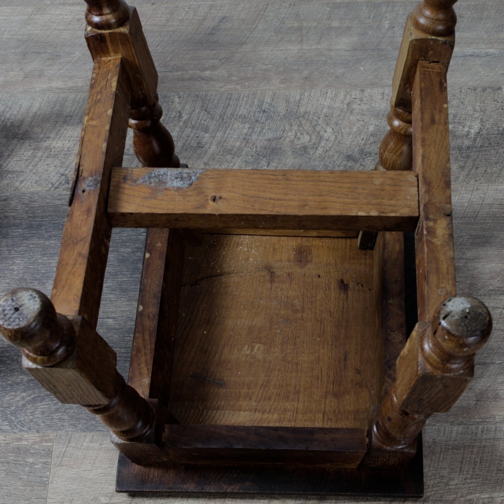 A pair of 19th-century oak joint stools featuring square tops, turned baluster legs, pegged joinery, and low perimeter stretchers. View IX
