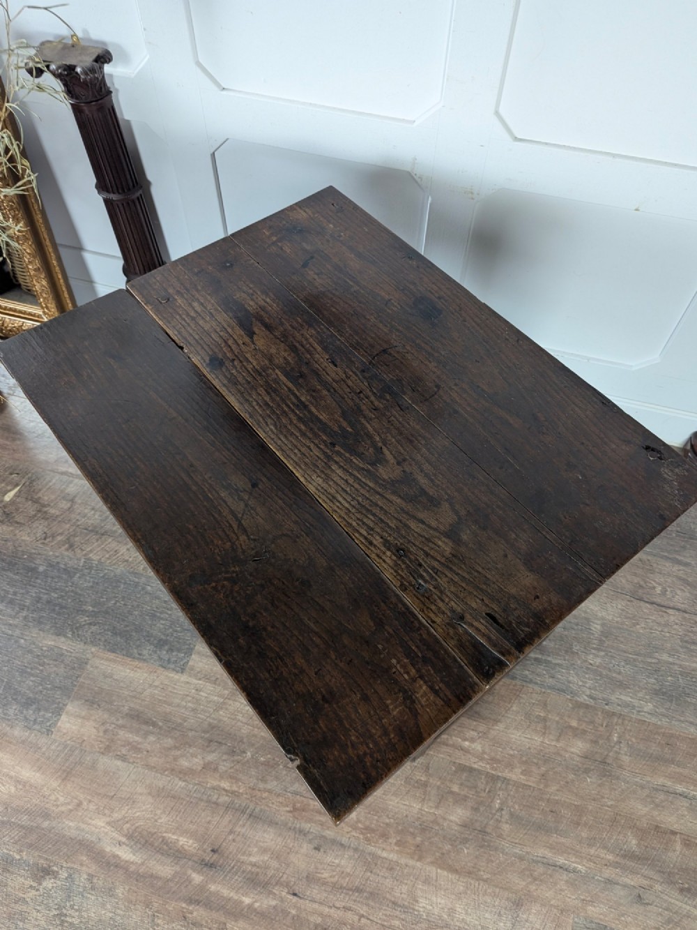 An eighteenth-century dark oak gateleg table with drop leaves, turned legs, stretchers, and a single end drawer. View XI