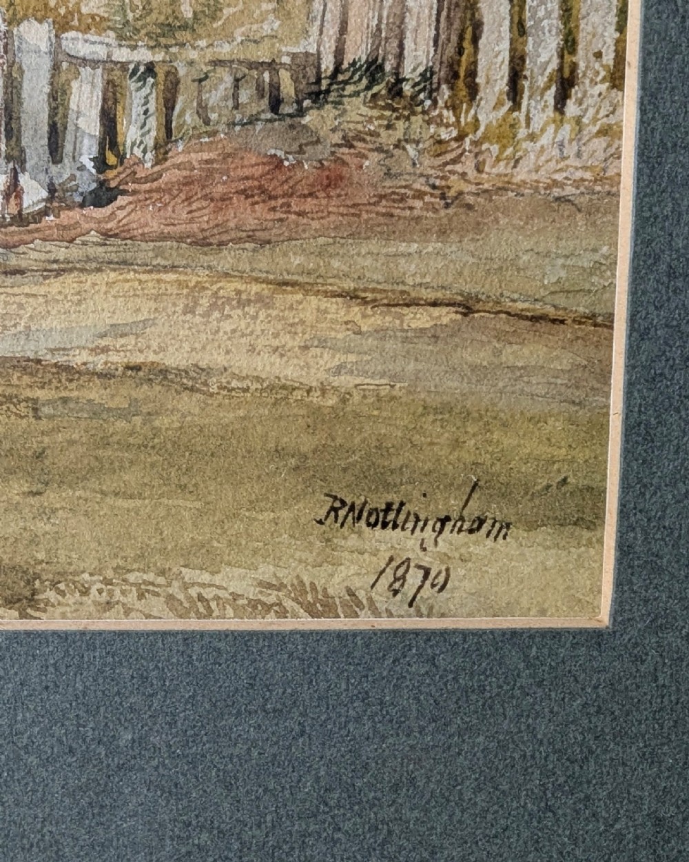 Pair of 1879 Victorian watercolour paintings depicting rural English cottage landscapes, presented in dark green mounts and light wood frames. View V