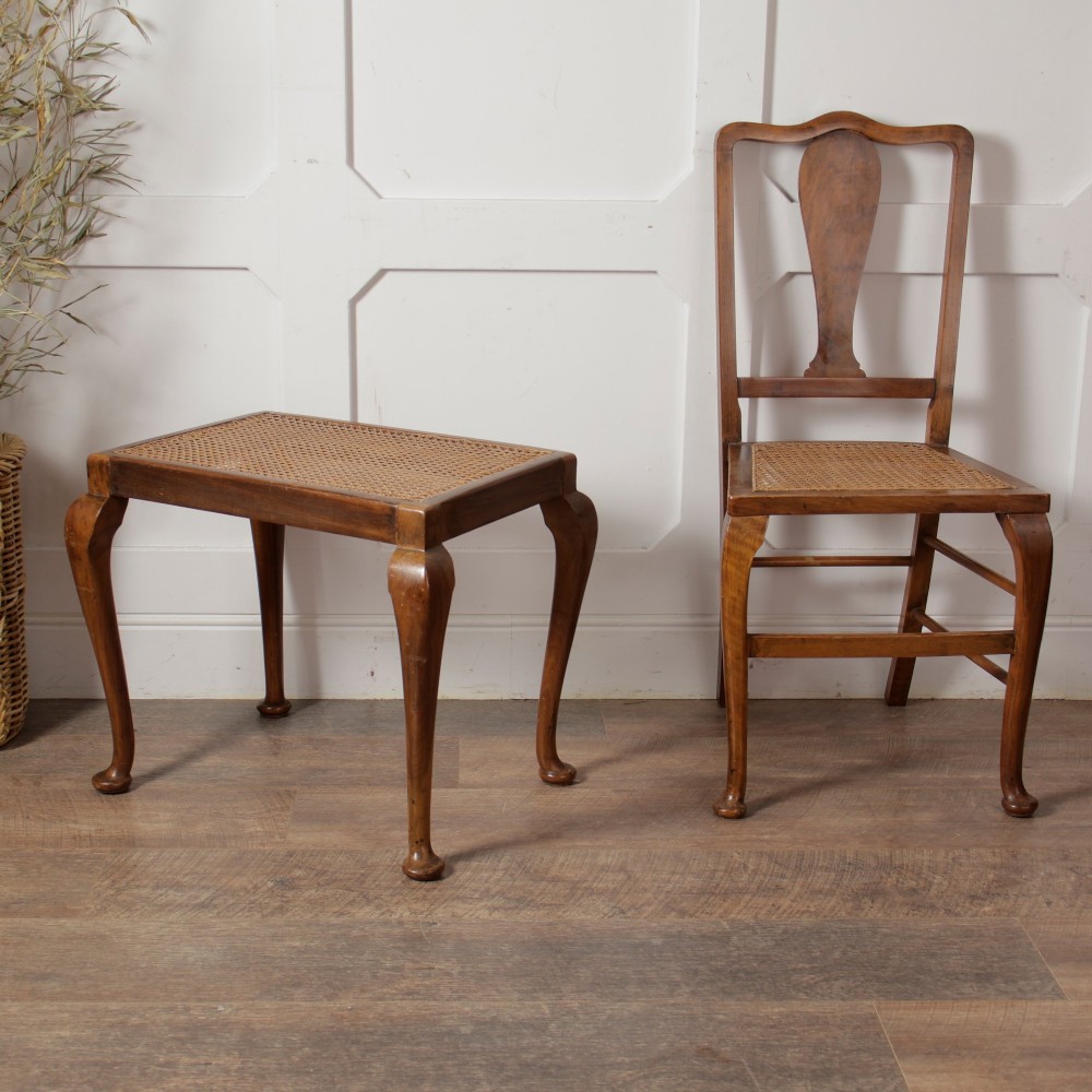 A low walnut luggage stand featuring a rectangular woven rattan top supported by four cabriole legs with pad feet. View II