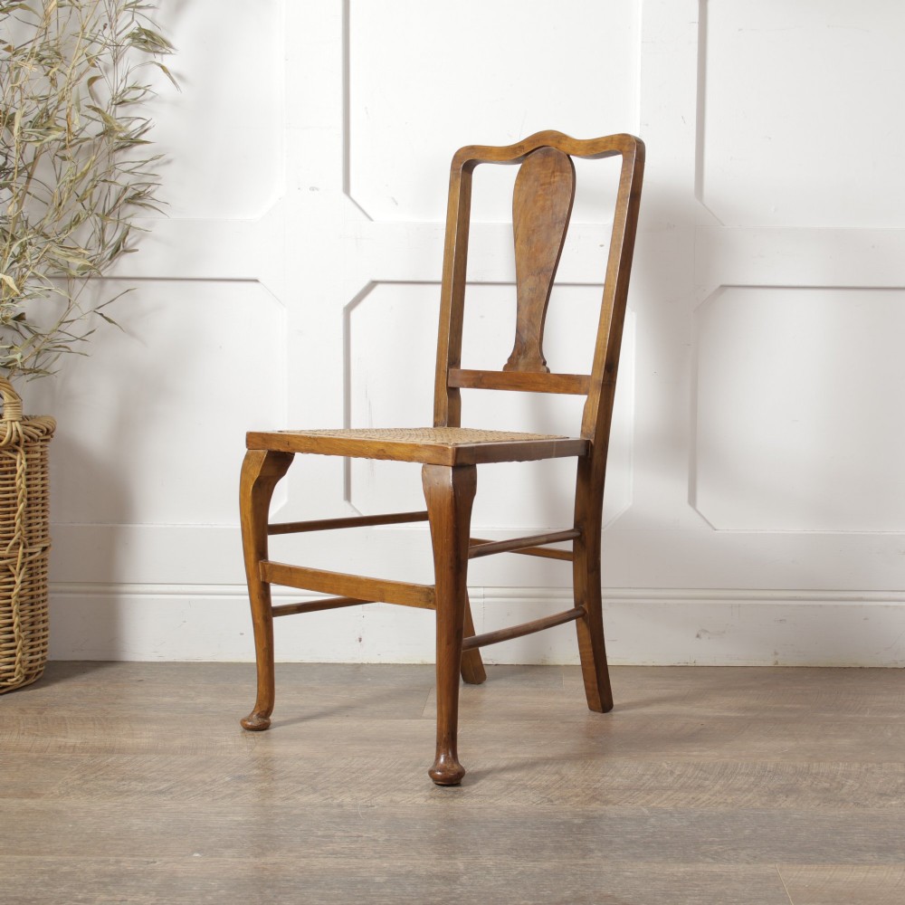 A low walnut luggage stand featuring a rectangular woven rattan top supported by four cabriole legs with pad feet. View XI