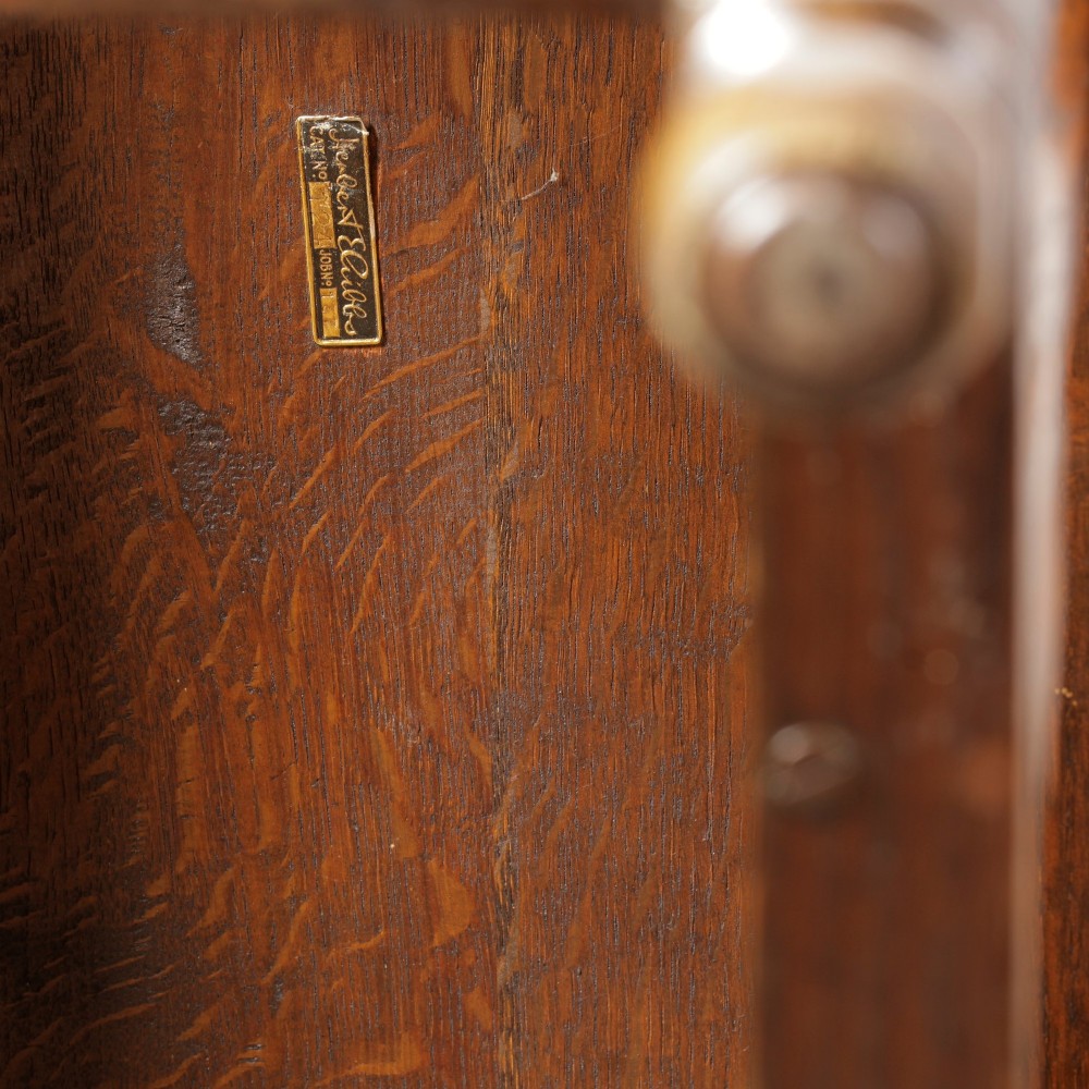 A small oak gateleg side table with turned legs, drop-down side flaps, and a warm brown wood finish. View XIV