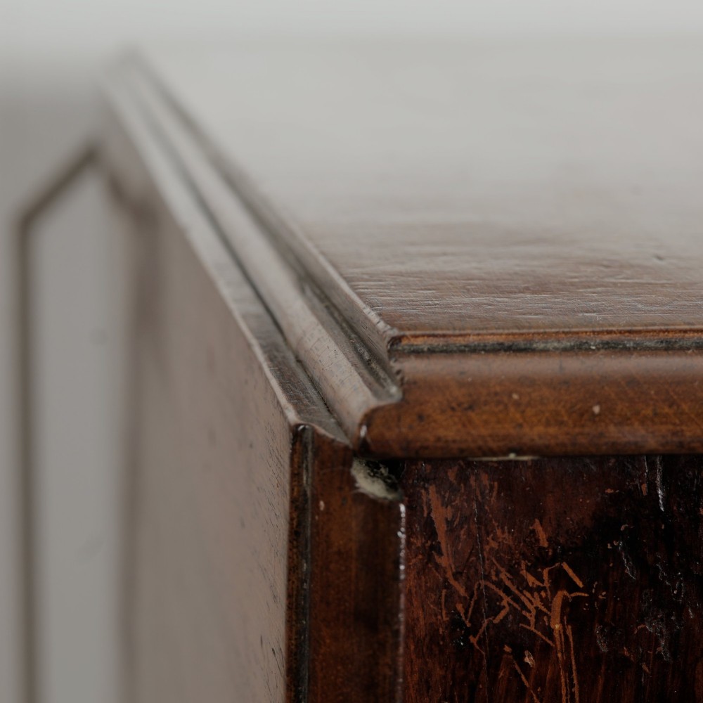 A Victorian mahogany gateleg table with two hinged drop leaves, a rectangular top, and turned wooden legs. View X