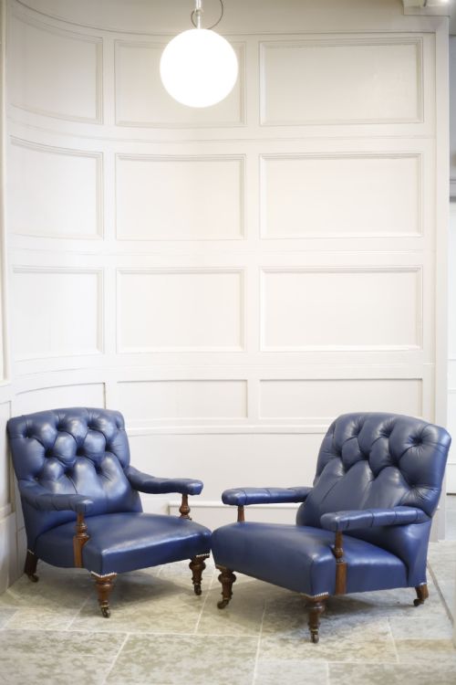 Pair of Victorian His and Hers Leather Open Armed Armchairs