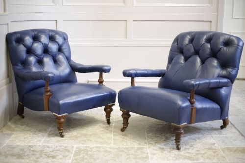fig 1. Pair of Victorian his and hers Leather open armed armchairs