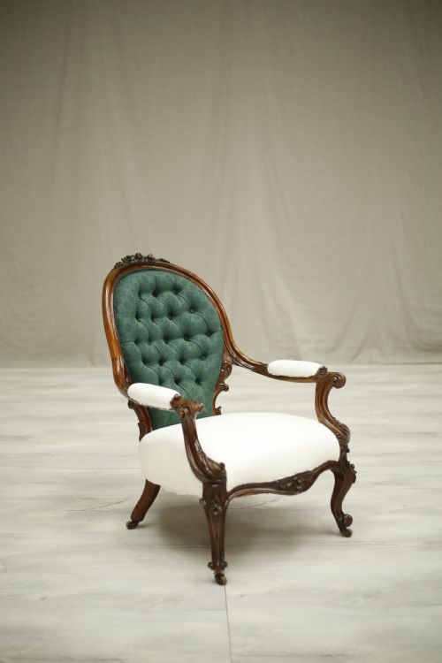 Buttoned Early Victorian Carved Open Armchair