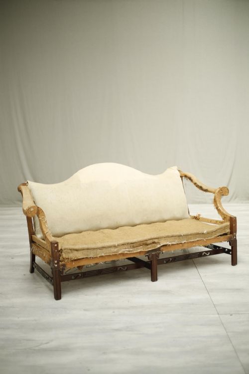 American C.1920's Camel Backed Sofa with Fret Work Stretcher