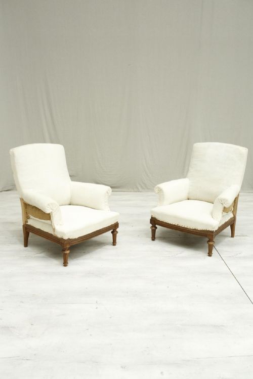 Pair of French Armchairs with Carved Frame