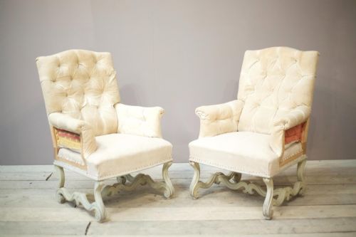 fig 1. Pair of French buttoned armchairs with carved frame