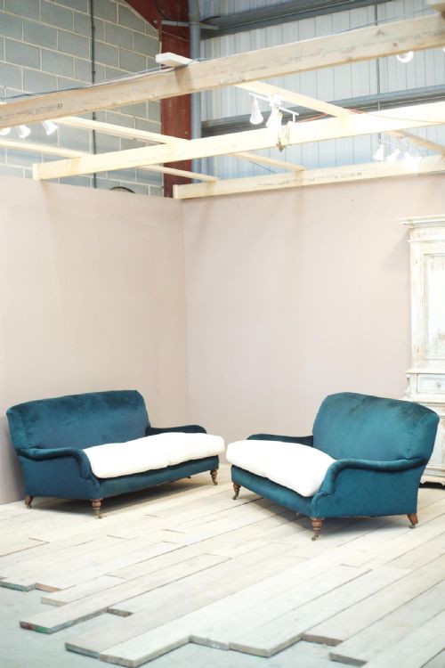 Pair of 20th Century Howard and Sons Style Sofas
