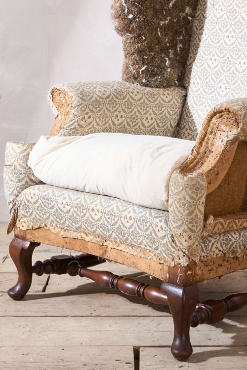 fig 1. 19th century Howard and sons Ennismore Wingback armchair