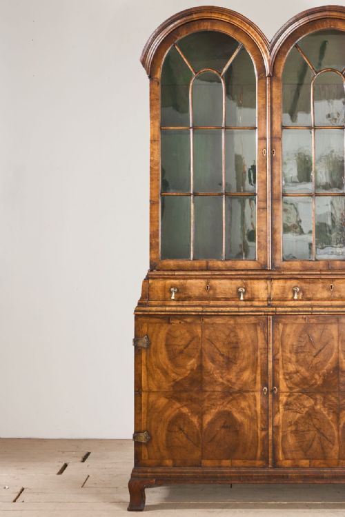 fig 1. 19th century George I style double arched walnut cabinet
