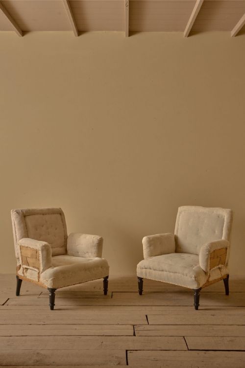 Pair of Napoleon III high backed pillow armed armchairs