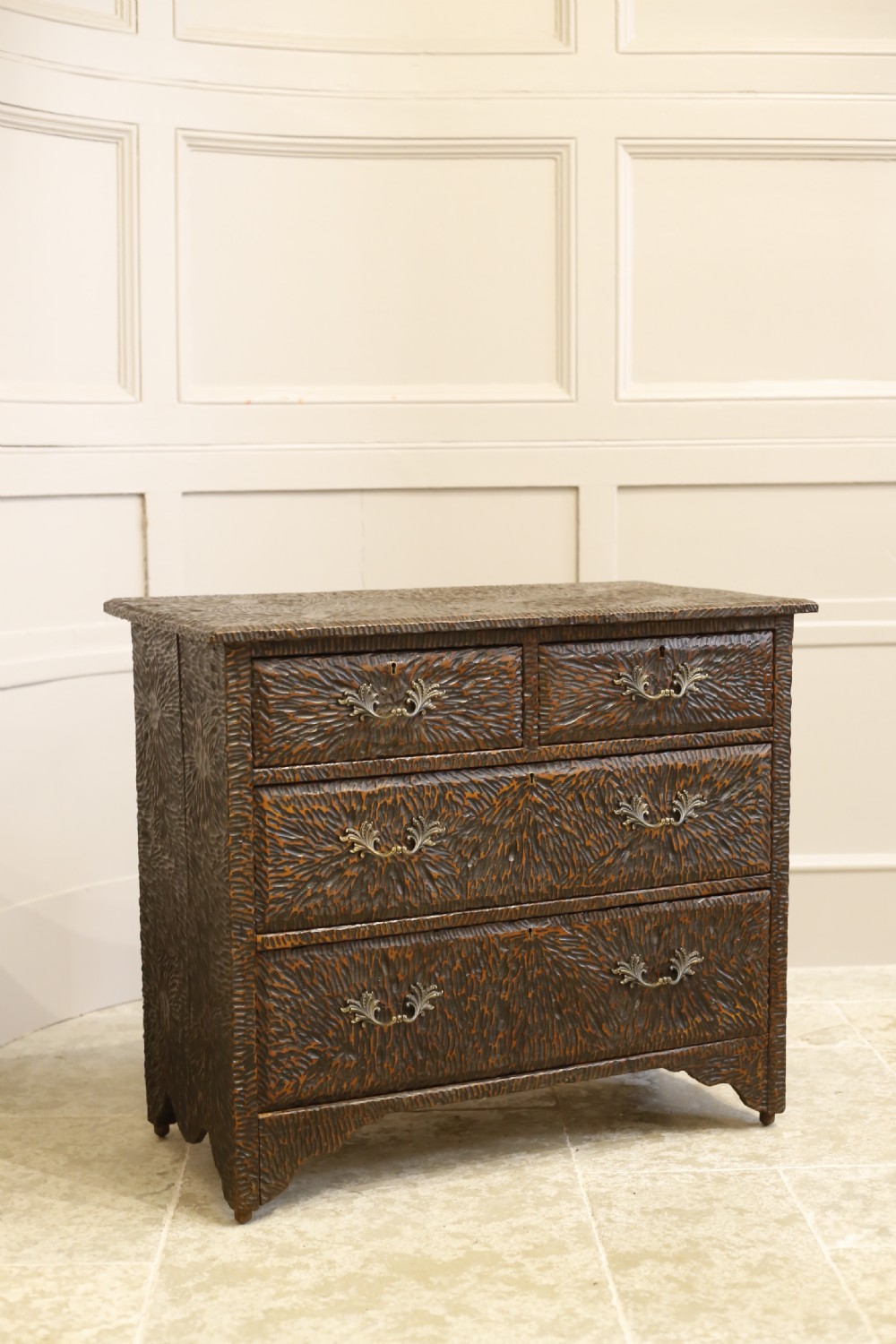 Early 20th century heavily carved chest of drawers