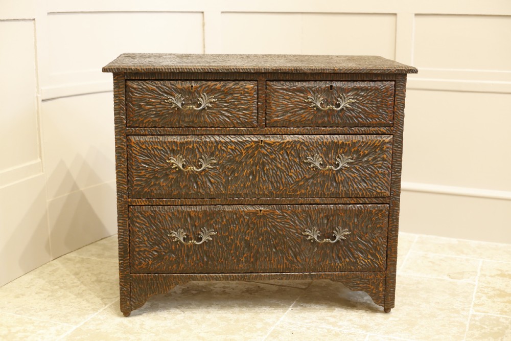 Early 20th century heavily carved chest of drawers View XI
