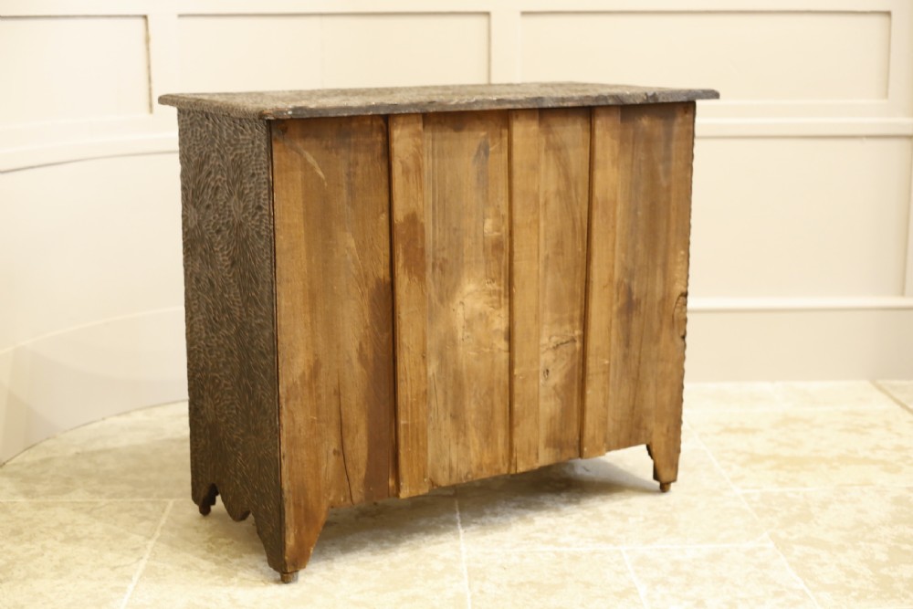 Early 20th century heavily carved chest of drawers View XII
