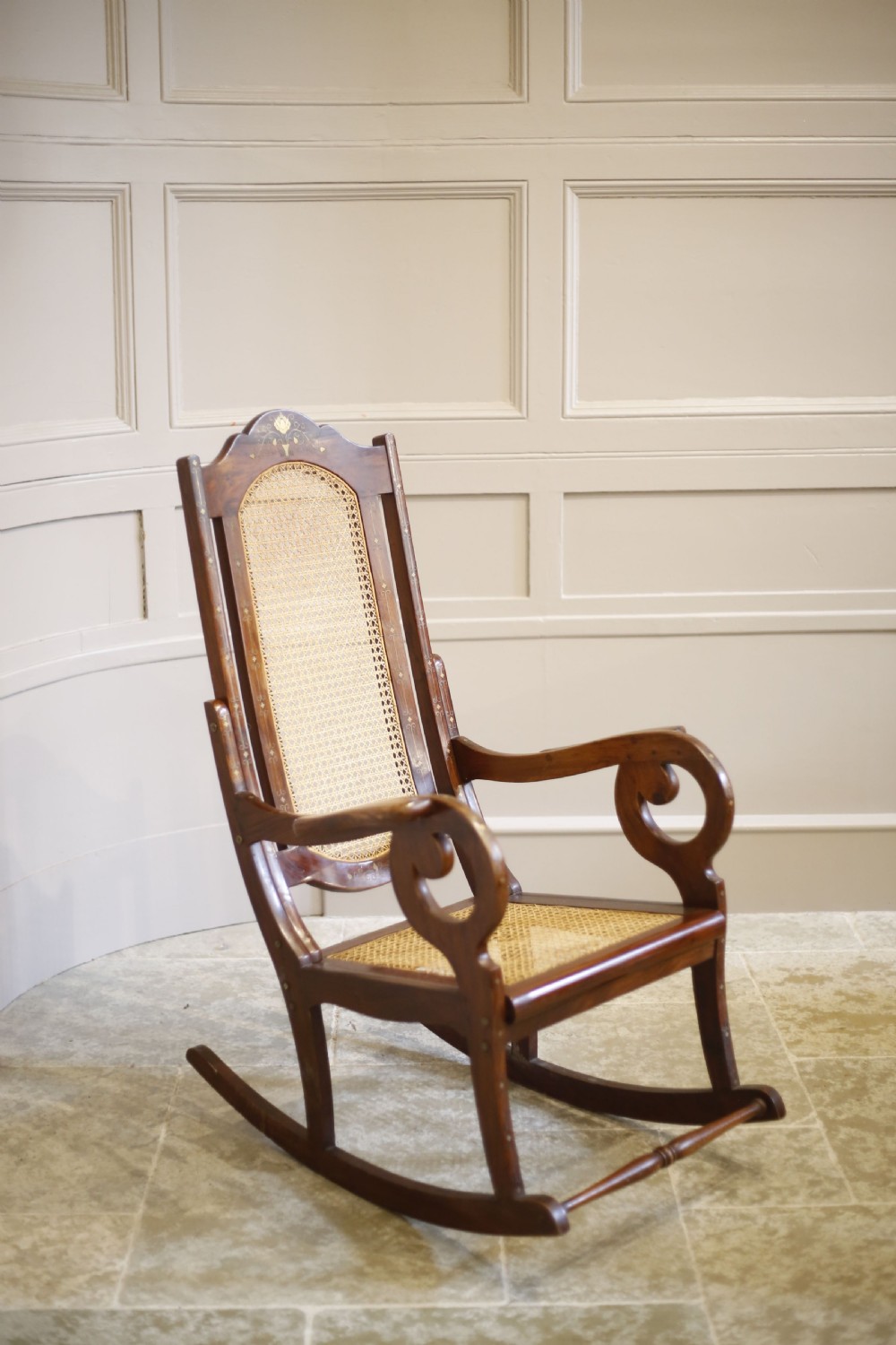 Early 20th century Indian Rattan and teak rocking chair