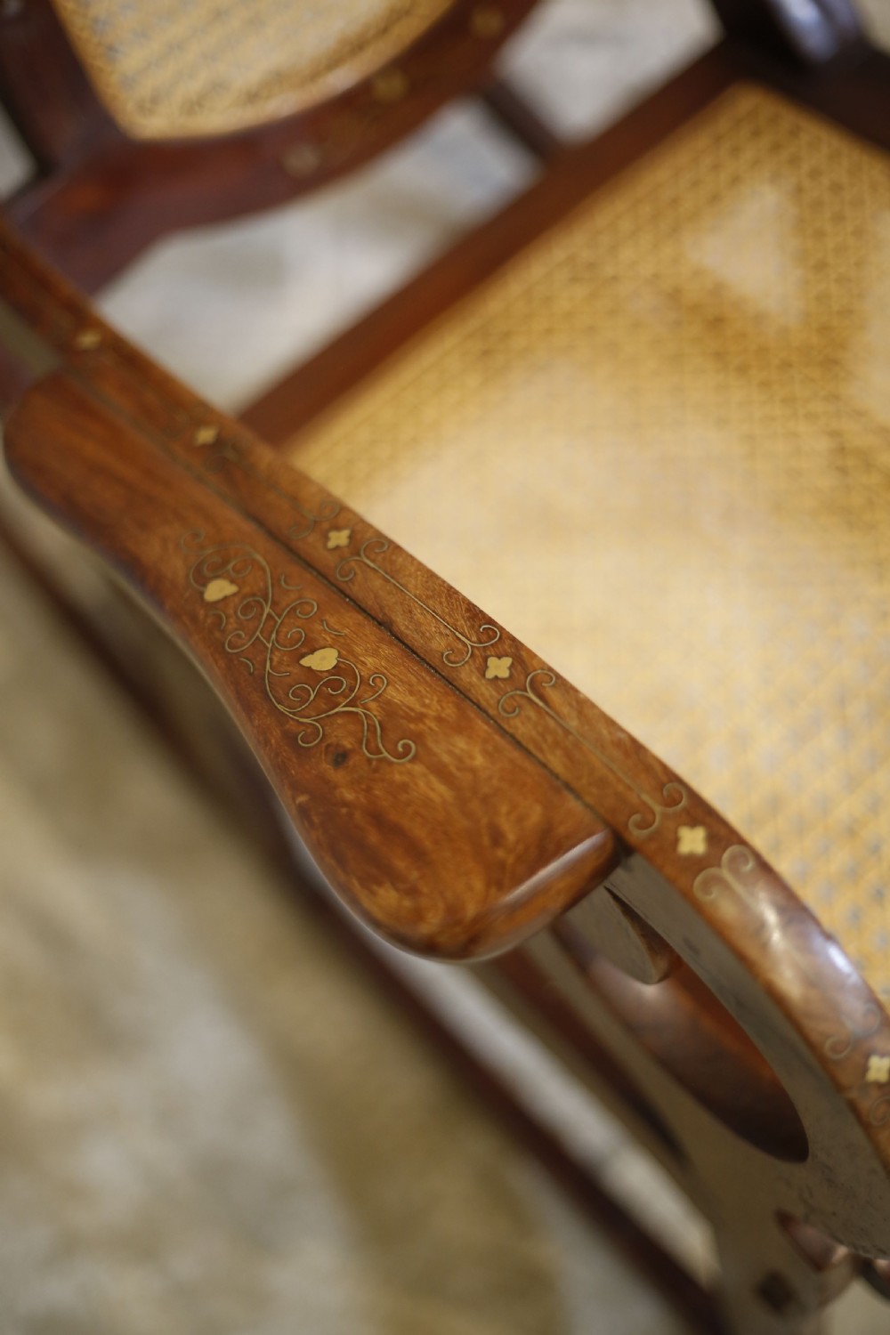 Early 20th century Indian Rattan and teak rocking chair View III