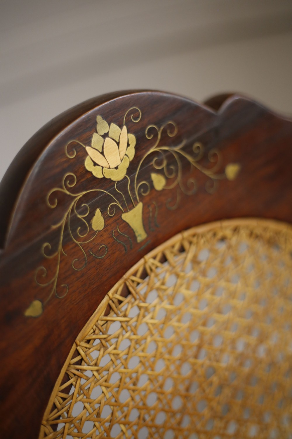 Early 20th century Indian Rattan and teak rocking chair View V